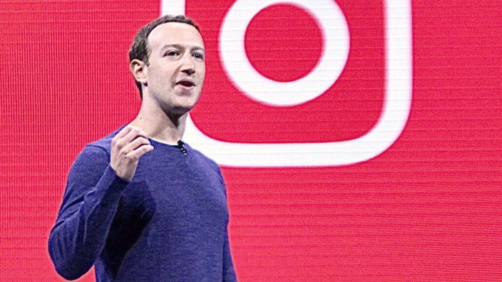 Facebook CEO Zuckerberg and Instagram logo File photo taken in May 2018 shows Facebook Inc. CEO Mark Zuckerberg speakin