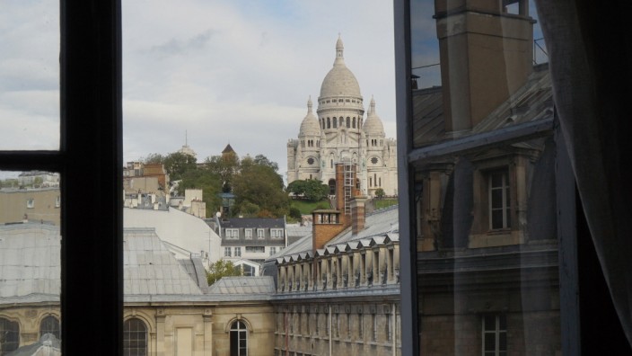 FRANCE - SACRE COEUR CHURCH IN PARIS The view on church Sacre Coeur from the Jacques Decour school. Paris, 2020/10/21. P