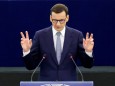 Polish PM and EU chief executive in debate on Poland's challenge to the supremacy of EU laws, in Strasbourg