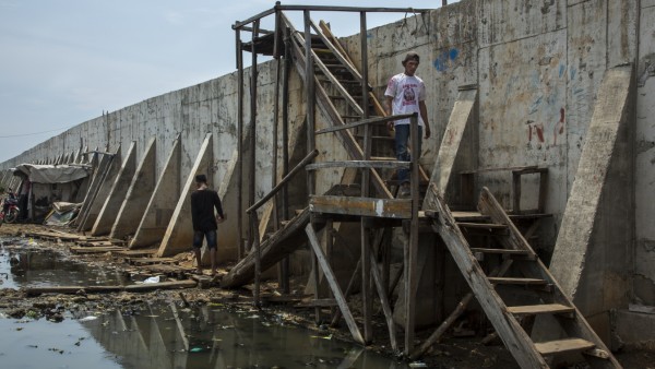 Indonesia Tackles Rising Waters At Jakarta's Sinking City