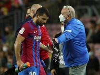 FC Barcelona, Barca s striker Sergio Kun Aguero (C) leaves the field after suffering an injury during the Spanish LaLig