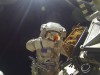 International Space Station crew member Volkov performs spacewalk outside ISS