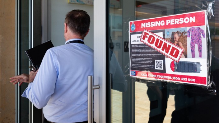 CLEO SMITH FOUND WA, A Missing Person poster for Cleo Smith has a Found sticker placed over it at the police station in