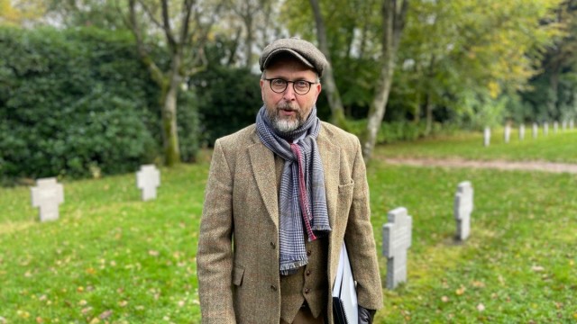 Attached are the photos of me, they show museum director Claus Kjeld Jensen at the cemetery of the German refugees from 1945-49 and in the construction site of the new camp-museum building