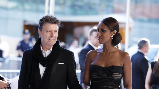 File photo of singer Bowie arriving with his wife Iman to attend the CFDA fashion awards in New York