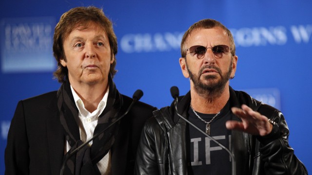 Former Beatles McCartney and Starr speak at a news conference in New York