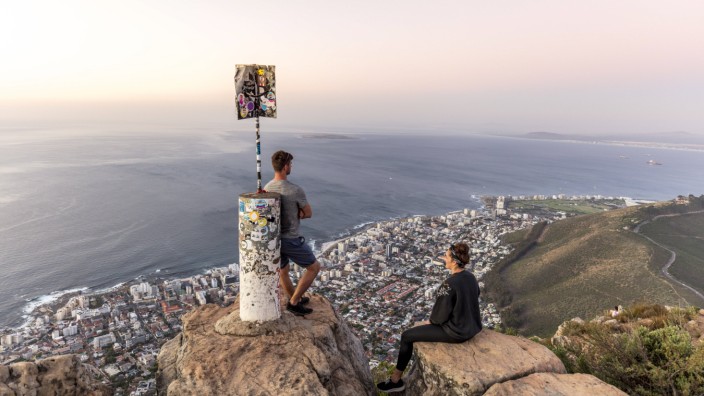South Africa Cape Town Lions Head Sea Point couple enjoying the view at sunset model released Sy