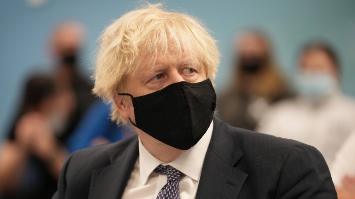 December 6, 2021, Liverpool, UK: Boris Johnson attends a briefing at Merseyside Police HQ before watching a raid on a h