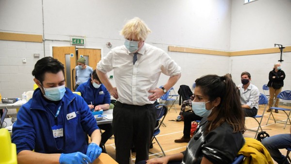 British Prime Minister Boris Johnson visits a vaccination centre in Westminster