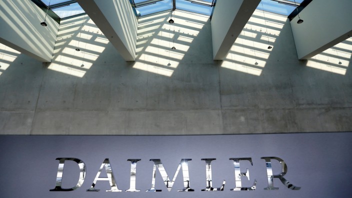 FILE PHOTO: FILE PHOTO: The Daimler logo is seen before the carmaker's annual shareholder meeting in Berlin