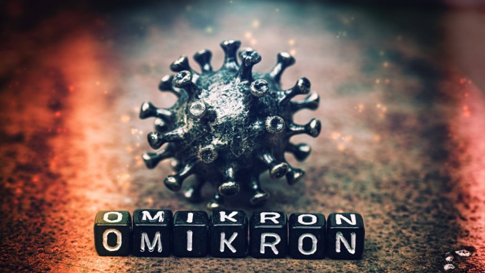 FOTOMONTAGE, Coronavirus mit Schriftzug Omikron, Symbolfoto Omikron-Variante B.1.1.529 *** PHOTOMONTAGE, coronavirus wit