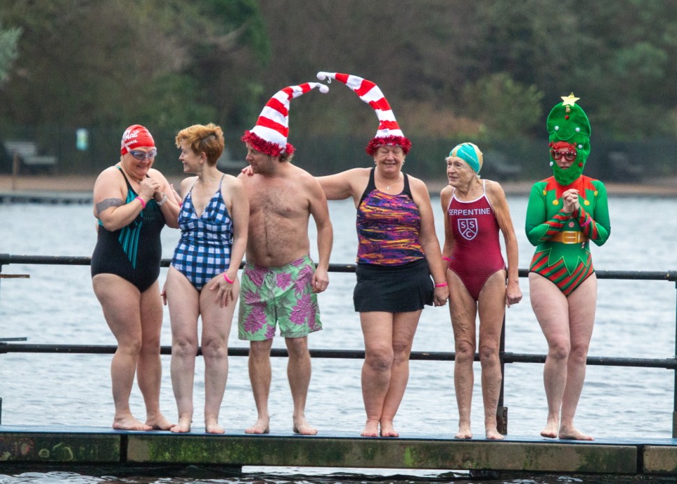 December 25, 2021, London, England, United Kingdom: Swimmers of the Serpentine Swimming Club take part in the Peter Pan