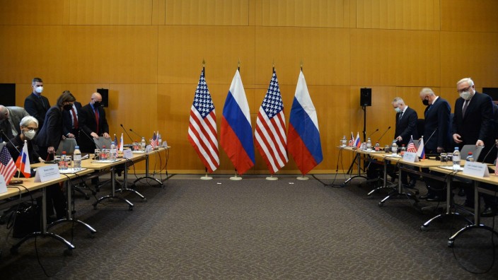 Switzerland US Russia Security Guarantees Talks 6738284 10.01.2022 Participants take their sits during the talks on sec
