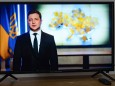 February 24, 2022, Kiev, Ukraine: A television screen showing President Volodymyr Zelensky s address to Russians..Today
