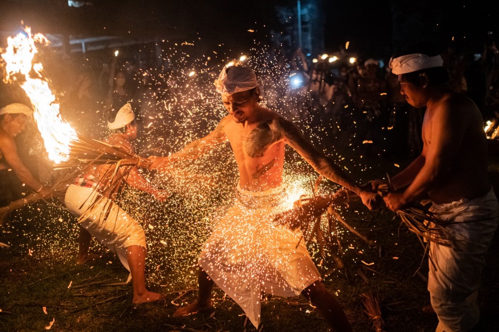 Balinese Hindus Take Part In Fire Fight Ritual