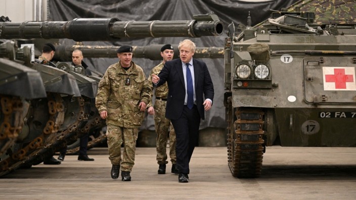 British PM Johnson and NATO Secretary-General Stoltenberg meet NATO troops at Tapa Military Base