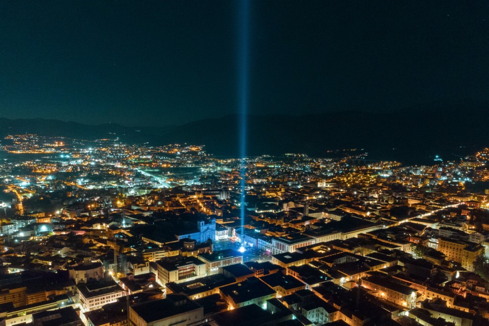 Earthquake Commemoration In L Aquila, Italy Aerial drone view of a light beam shining during ceremony of 13th anniversar