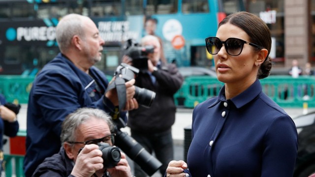 Player Wives: Another little stop for the photographers: Rebekah Vardy on her way to court.