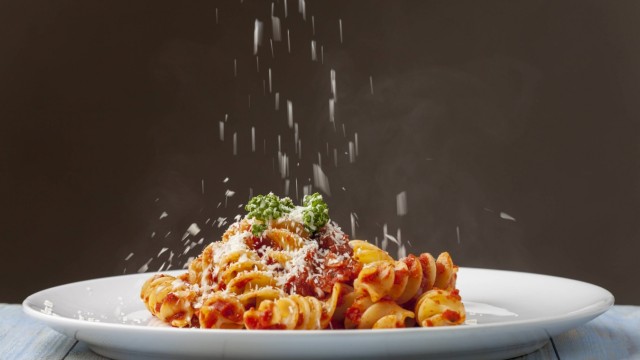 Parmigiano Reggiano: Lunch is only ready when Parmesan is added to the pasta with tomato sauce.