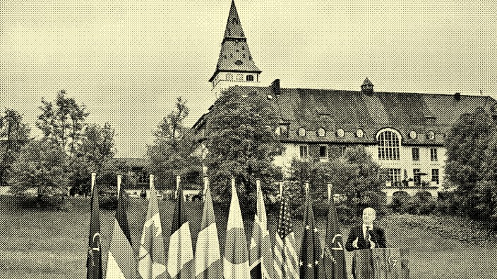 G-7-Gipfel: Kanzler Olaf Scholz spricht vor idyllischer Kulisse beim G-7-Treffen auf Schloss Elmau.