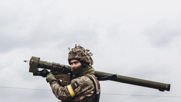 Air defense: too little, too old: a Ukrainian soldier shoulders one "Igla-1"-Soviet-made missile that can only engage airborne targets at close range.