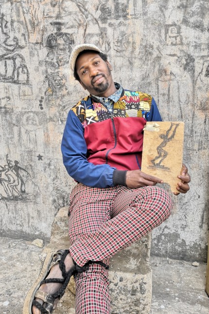 Street-Art in Dakar: Boye Diallo, genannt Modboye. Der ehemalige Breakdancer und Sprüher versteht sich als Kurator der Straßenkunst in Medina, Dakars ältestem Viertel.