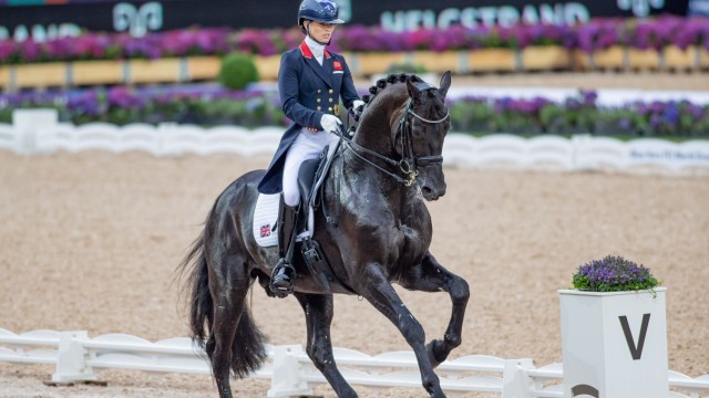 Equestrian: Impressing the spectators and the judges: Britain's Charlotte Fry on Glamourdale.
