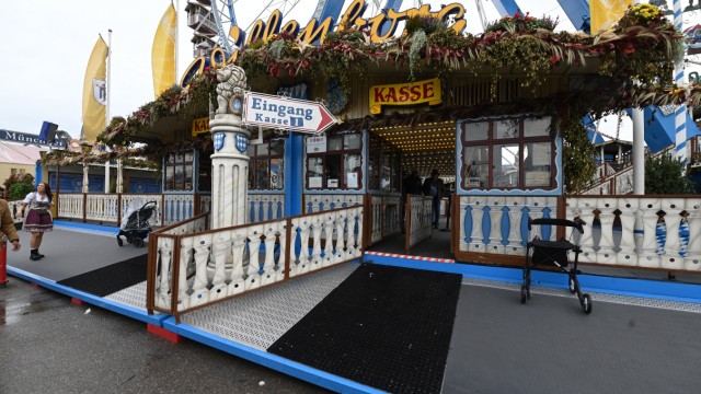 Accessibility test.  Access to the Oktoberfest Ferris Wheel cash registers is a barrier for wheelchair users.