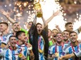 221218 Lionel Messi of Argentina lifts the FIFA World Cup, WM, Weltmeisterschaft, Fussball Trophy after the FIFA World