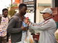 Tunisian volunteers distribute free Iftar food in Kabbaria, Tunisia - 17 May 2020