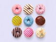Donuts,Creative,Pattern,On,Color,Background.,Healthy,Sweet,Food,And