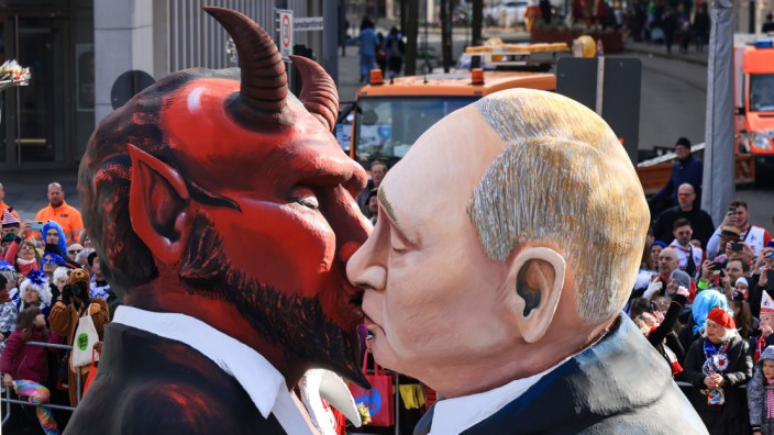 Rhetorik: Komplexitätsreduzierung im Kölner Karneval: Putin beim Teufelskuss.