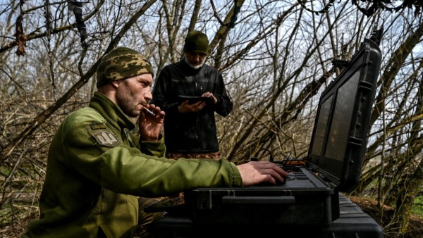 Ukrainian servicemen prepare an unmanned aerial vehicle at a position near a frontline in Zaporizhzhia region
