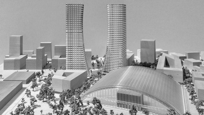 Architektur in München: Zwei Türme, die sich einander zuwenden: Das Foto eines Modells zeigt den aktuellen Stand der Planung für die Hochhäuser an der Paketposthalle.