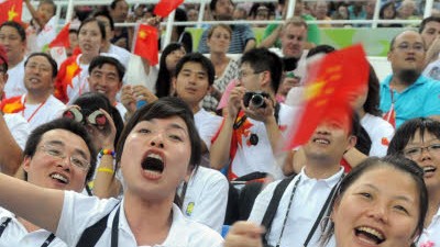 Olympische Spiele: Chinas Aktienmarkt will sich nicht von der allgemeinen Olympia-Euphorie anstecken lassen.