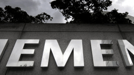 Siemens legt Zahlen vor: Dunkle Wolken über Siemens: Der Konzernumbau und die Aufdeckung des Korruptionsskandals belasten den Konzern finanziell.