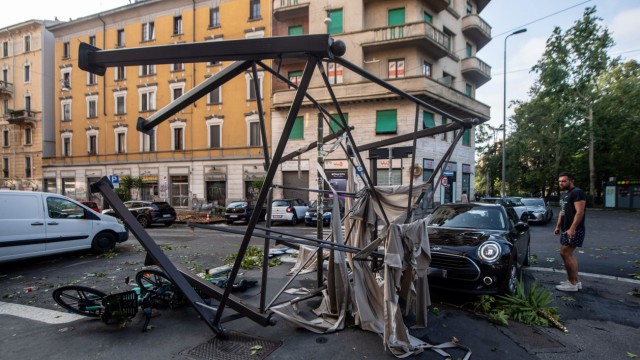Natural disaster: Milan was particularly hard hit by the storms.  The picture shows a scaffolding that has been toppled by the wind.