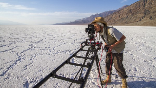 German Wildlife Cameraman, Rolf Steinmann, setting up a tracking time-lapse in Badwater Basin, Death Valley, California,