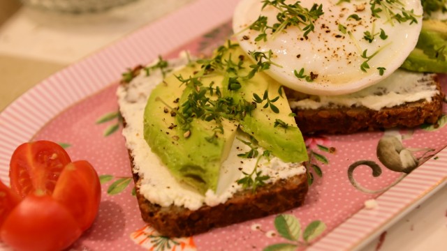Café Isabella: The Breakfast Avocado Star: Gluten-free protein bread with cream cheese, avocado and two poached eggs.