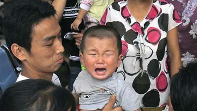 Milch-Skandal in China: Weinende Kinder, verunsicherte Eltern: Der Milch-Skandal in China weitet sich aus.