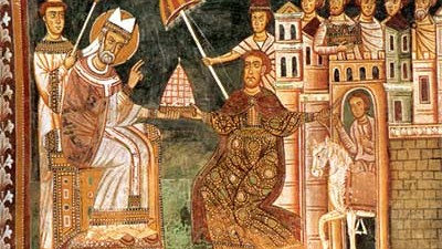 Frage der Woche: Ein Fresko in der Basilika Santi Quattro Coronati in Rom aus dem Jahre 1246 zeigt, wie Kaiser Konstanin dem Papst Silvester Tiara und damit weltliche Macht übergibt.