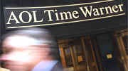 Billig-Konkurrenz: Passanten huschen an der Hauptverwaltung von AOL Time Warner in New York vorbei.