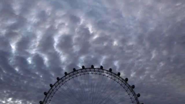 The London Eye is seen on the South Bank of the River Thames in central London