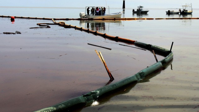 Oil floats on the surface in Pass A Loutre near Venice, Louisiana