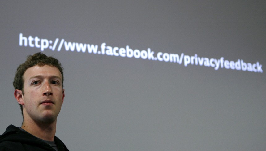 Facebook CEO Zuckerberg takes a question during a news conference at Facebook headquarters in Palo Alto