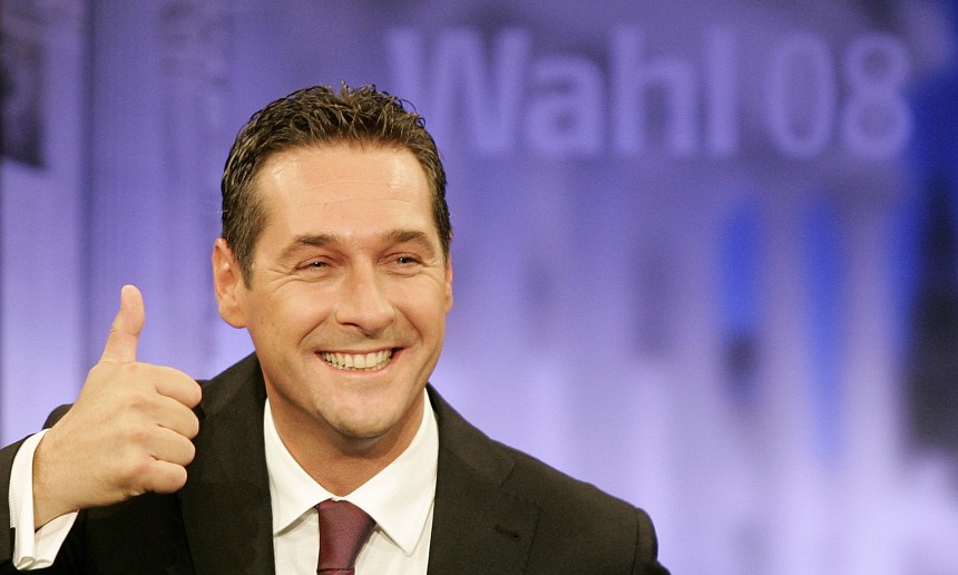 Austria's Freedom party leader Strache reacts as he arrives for a TV discussion in Vienna