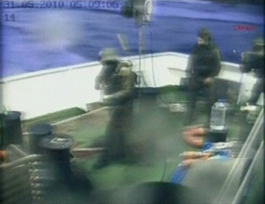 A frame grab shows Israeli commandos on a Gaza-bound ship in the Mediterranean Sea