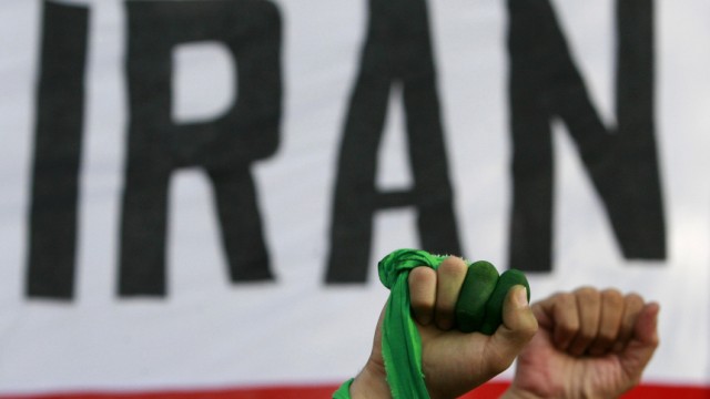 Iranian-born citizens living in Islamabad shout 'Free Iran' during a rally in Islamabad
