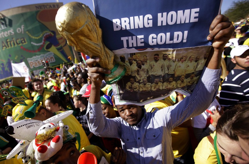 Supporters of 'Bafana Bafana' celebrate during a parade in Johannesburg