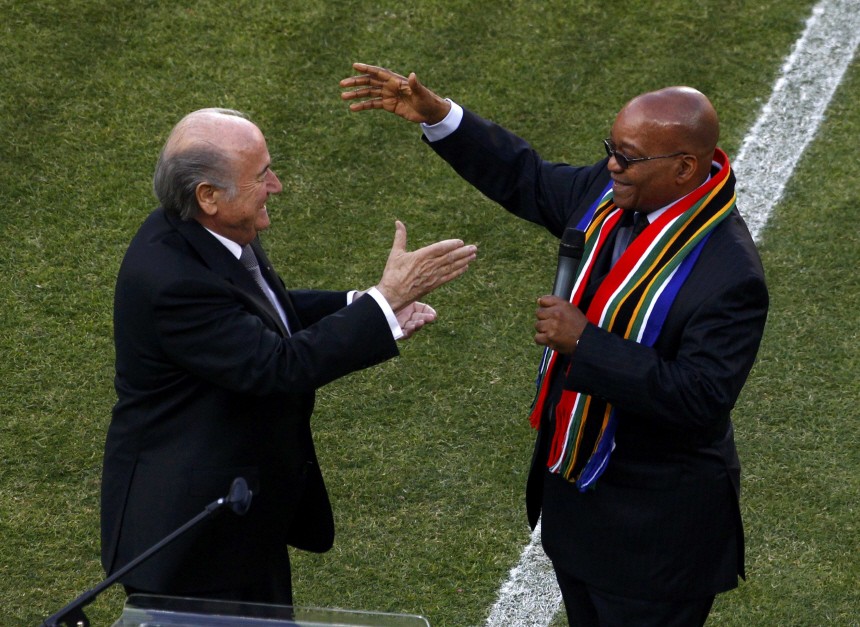 FIFA President Blatter greets South Africa's President Zuma ahead of the 2010 World Cup opening at Soccer City stadium in Johannesburg